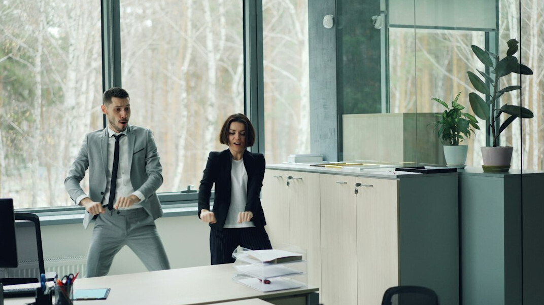 team doing office exercises