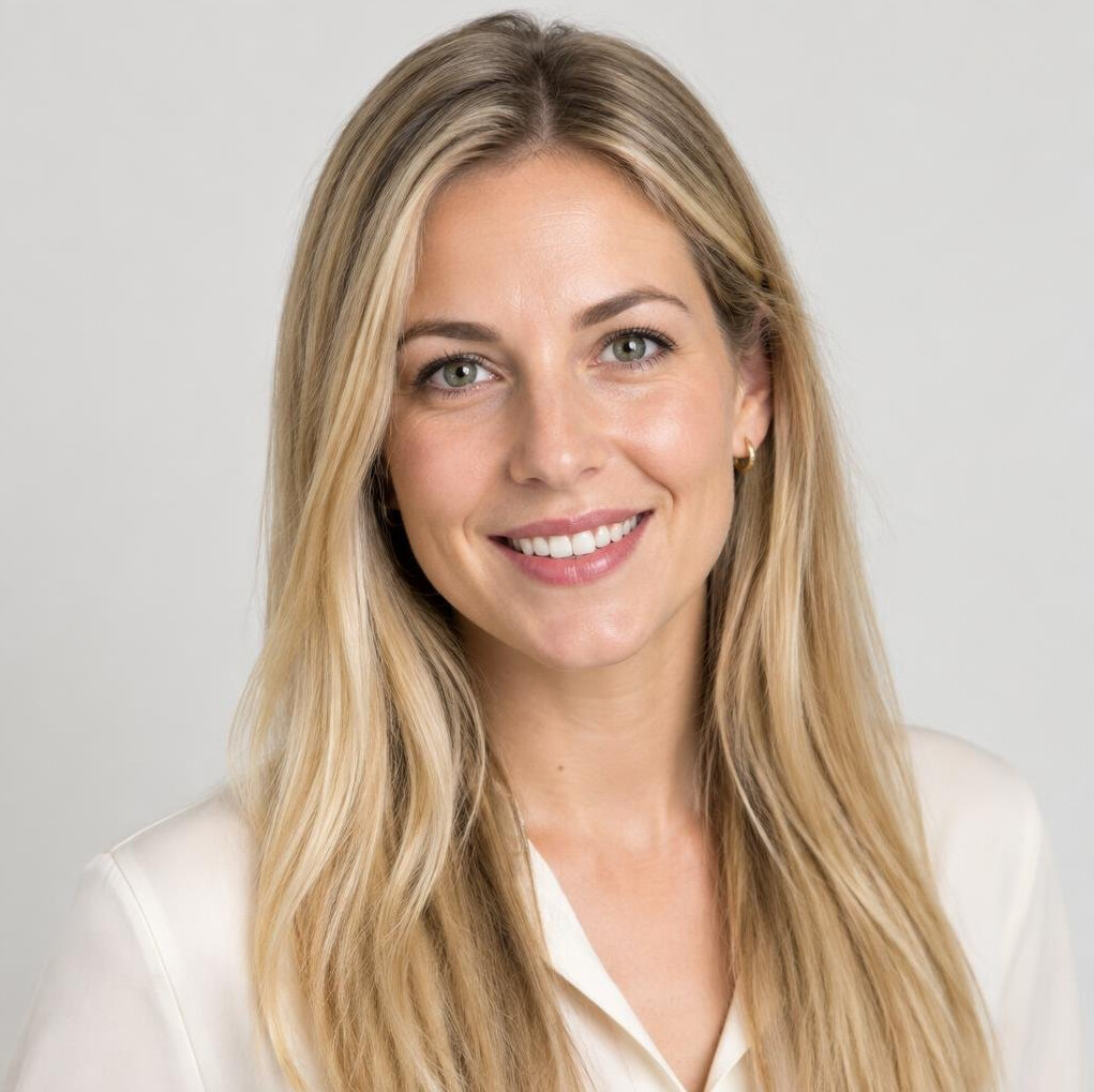 Studio portrait of a young Slovenian woman in office attire