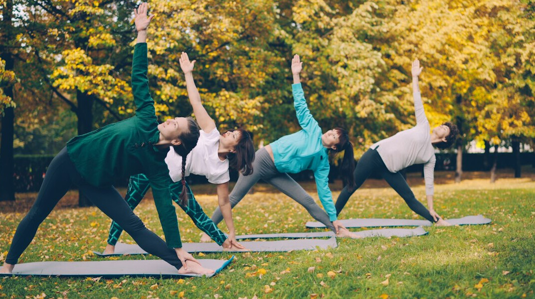 group yoga session outdoors