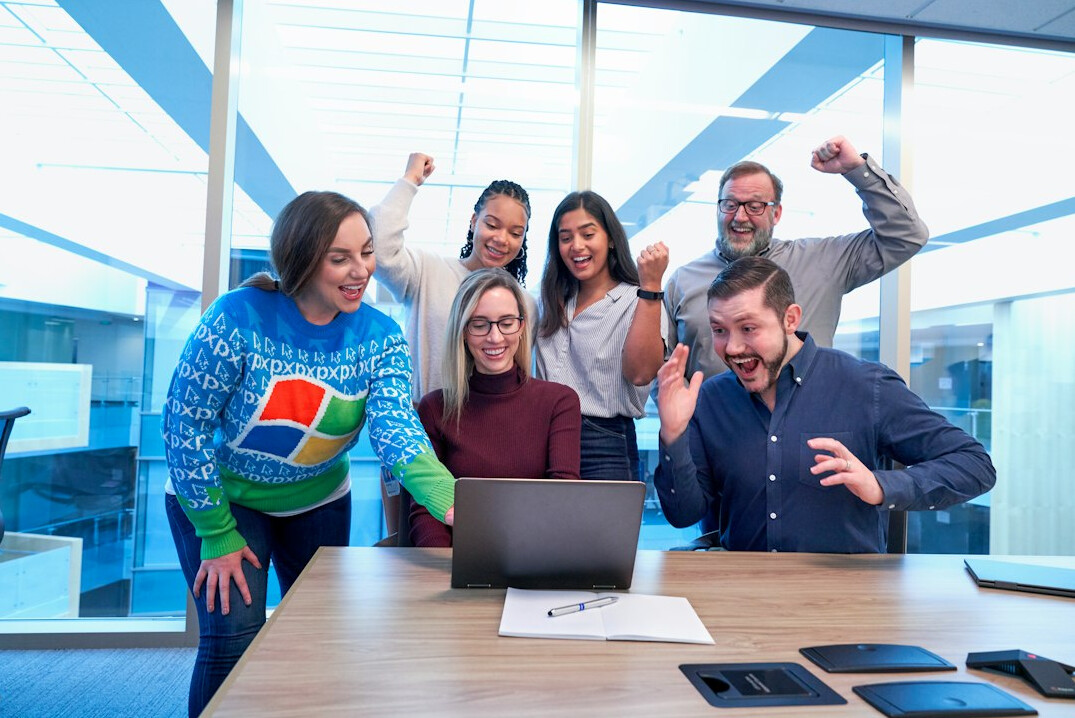 diverse office team smiling